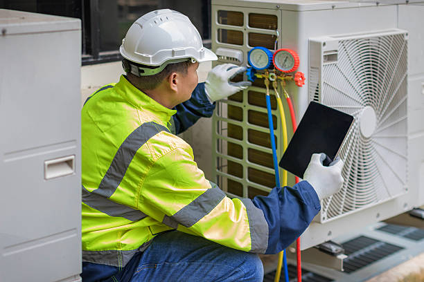 Professional Hvac technician working in Peachland, NC